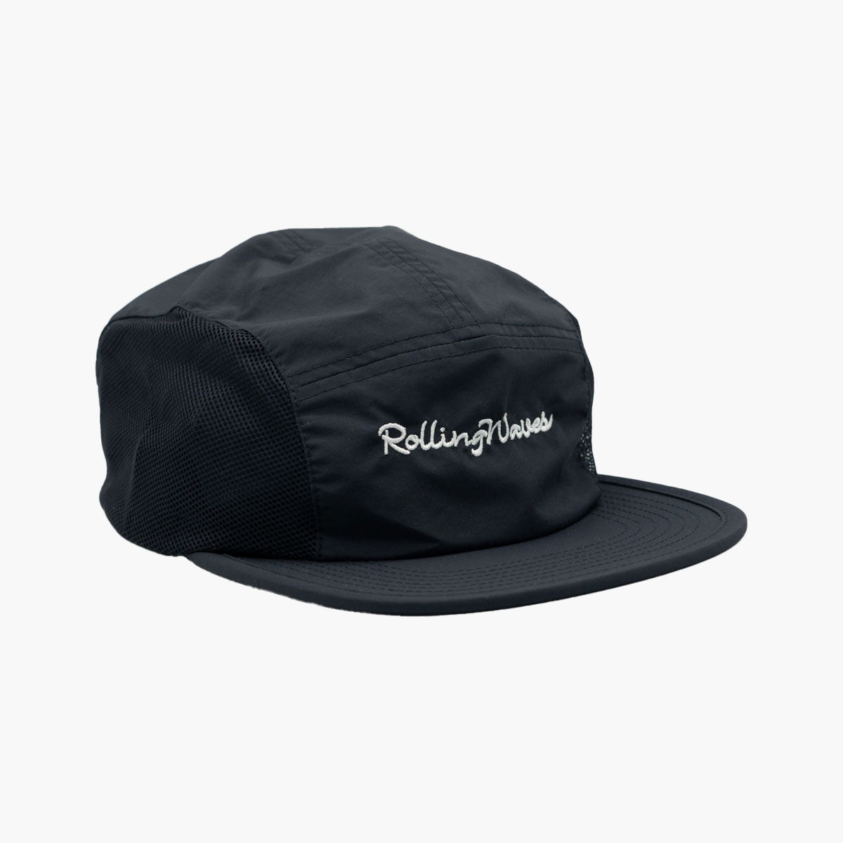 Side angle of Rolling Waves Active 5-Panel Hat in dark blue with bone color designs, recycled nylon performance cap with mesh panels and UPF 50+ protection